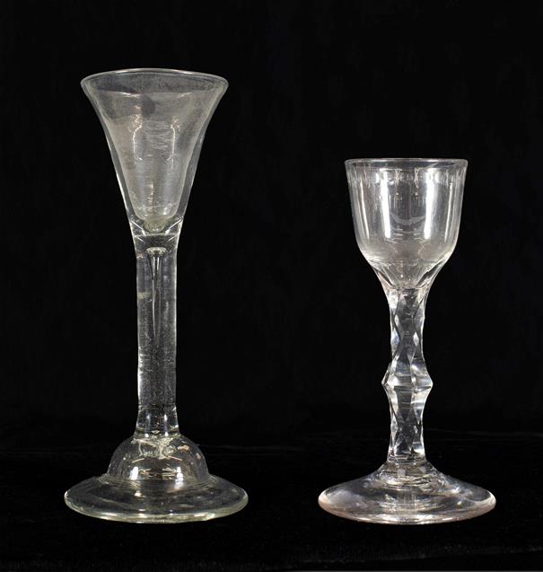 Lot 1 - A Wine Glass, circa 1750, the drawn trumpet bowl on plain stem with air tear and domed foot,...