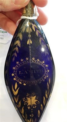 Lot 6 - A Blue Glass Scent Bottle, circa 1770, gilt in the manner of James Giles with a cartouche inscribed