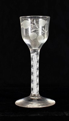 Lot 10 - A Wine Glass, circa 1750, of Jacobite interest, the ogee bowl engraved with a rosebud and bird...
