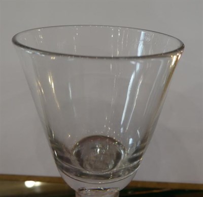 Lot 15 - A Cordial Glass, circa 1750, the rounded funnel bowl with solid base on a double series air...