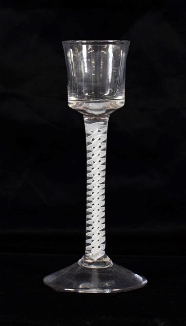 Lot 16 - A Cordial Glass, circa 1775, the bucket shaped bowl on an opaque twist stem, 16cm high  Provenance