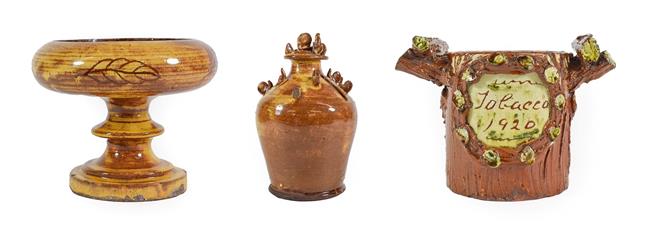 Lot 37 - A Buckley Slipware Money Box, late 19th century, of baluster form, applied with hens and...