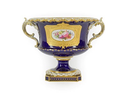 Lot 50 - A Royal Crown Derby Porcelain Campana Shaped Vase, by Albert Gregory, 1915, painted with a spray of
