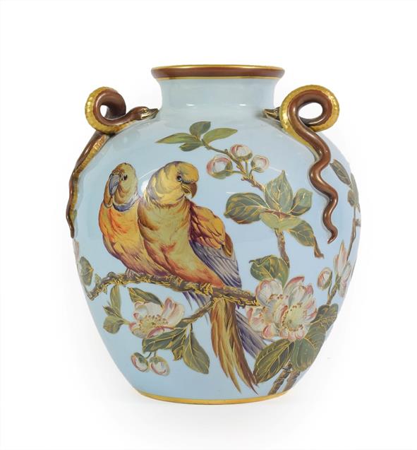 Lot 51 - A Royal Worcester Porcelain Vase, 1887, of ovoid form with triple entwined serpent handles, painted