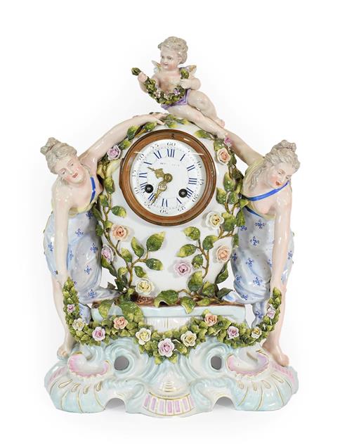 Lot 62 - A Meissen Style Porcelain Cased Mantel Clock, late 19th century, of flower encrusted baluster shape