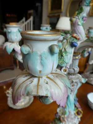 Lot 68 - A Meissen Porcelain Seven-Light Figural Candelabrum, late 19th century, with flower encrusted...