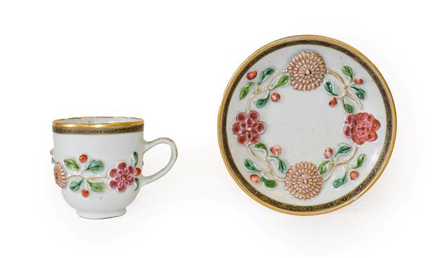 Lot 77 - A Chinese Porcelain Coffee Cup and Saucer, Yongzheng/early Qianlong, moulded and painted in famille