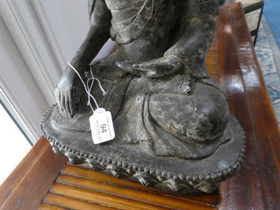 Lot 94 - A Sino-Tibetan Bronze Buddha, in 17th century style, seated cross-legged on a lotus cast base, 40cm