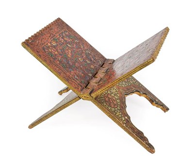 Lot 100 - A Persian Painted Wood Koran Stand, late 19th/20th century, of traditional X form with...