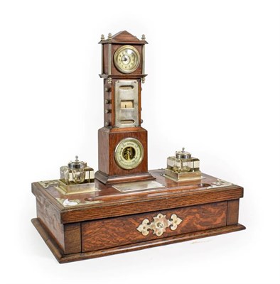 Lot 105 - A Silver Plate Mounted Oak Deskstand, circa 1900, surmounted by a miniature longcase clock,...