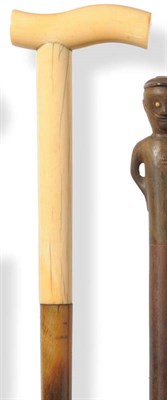 Lot 1230 - A Rhinoceros Horn and Hippopotamus Tusk Walking Stick, early 19th century, the shallow S carved...