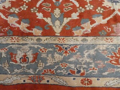 Lot 311 - Sultanabad Carpet West Iran circa 1900 The brick red lattice field of stylized flowerheads enclosed