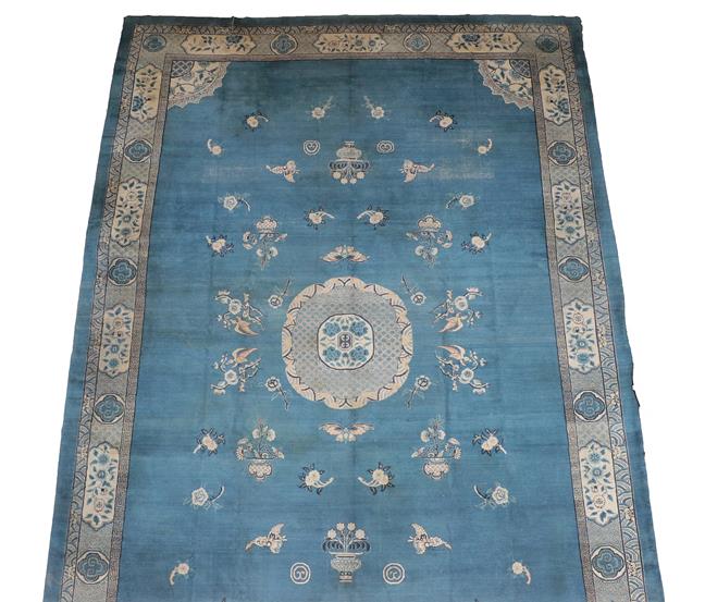 Lot 315 - A Chinese Design Carpet, possibly Turkish circa 1920 The pale indigo field with central roundel...