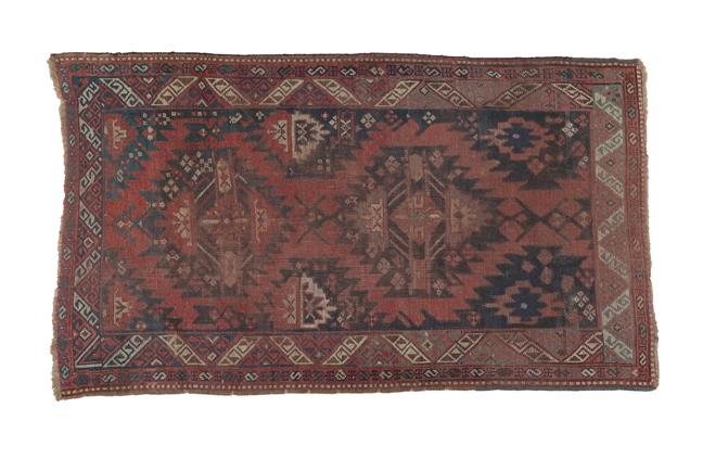 Lot 321 - Karabagh Rug South Caucasus, circa 1880 The indigo field with two serrated güls enclosed by...
