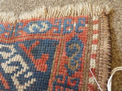 Lot 321 - Karabagh Rug South Caucasus, circa 1880 The indigo field with two serrated güls enclosed by...