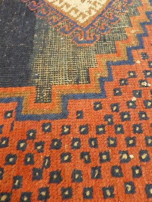 Lot 325 - Afshar Rug South East Iran, circa 1910 The abrashed stepped lozenge field with three hooked...