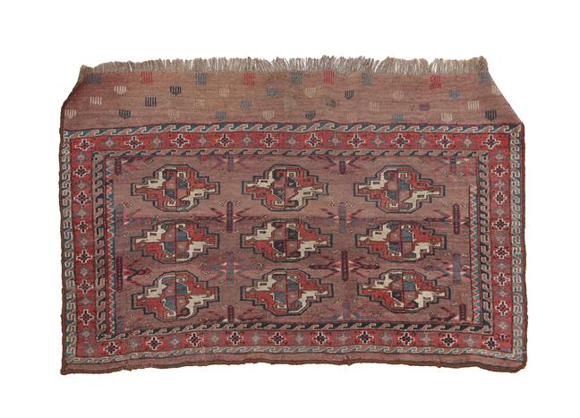 Lot 327 - Yomut Churval East Caspian, circa 1890 The abrashed pale chocolate field with three rows of...