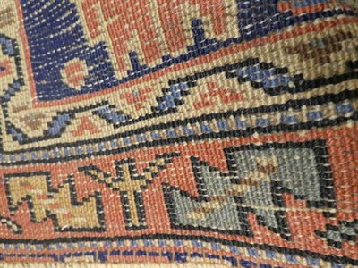 Lot 329 - Isparta Rug Central Anatolia, circa 1900 The deep indigo field with two hooked medallions...