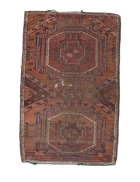 Lot 330 - Afghan Baluch Rug, circa 1900 The field with two octagonal güls enclosed by narrow borders,...