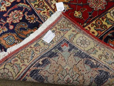 Lot 337 - Good Tabriz Carpet North West Iran, circa 1950 The blood red field with an allover Shah Abbas...