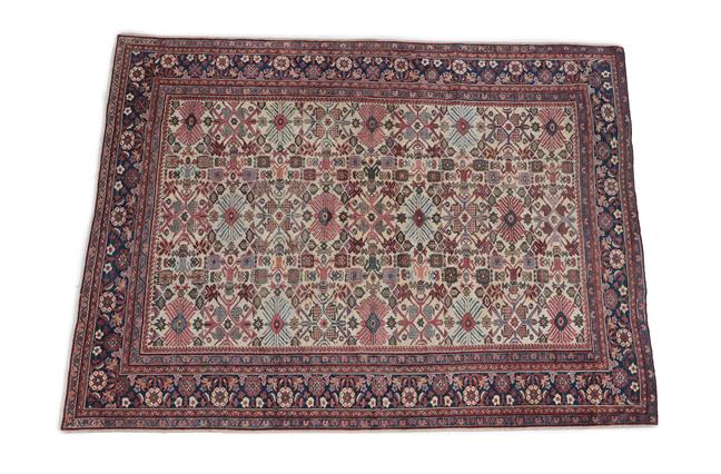 Lot 341 - Sultanabad Carpet West Iran, circa 1930 The ivory field with columns of large stylised...