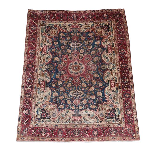 Lot 352 - Kashmar  Central East Iran, circa 1930 The indigo field of large flowerheads around a...