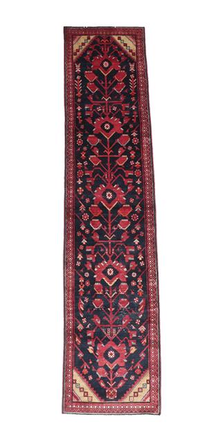 Lot 354 - Malayir Runner West Iran, circa 1940 The indigo field of large flowering plants framed by spandrels