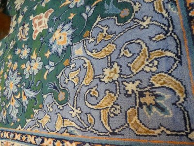 Lot 357 - Isfahan Region Carpet Central Iran, 2nd half 20th century The British racing green field of...