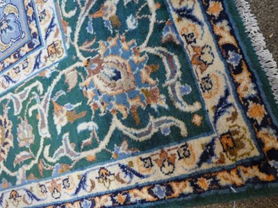 Lot 357 - Isfahan Region Carpet Central Iran, 2nd half 20th century The British racing green field of...