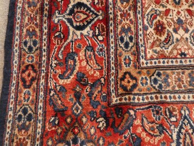 Lot 361 - Moud Khorasan Carpet East Iran, 20th century The indigo Herati field enclosed by brick red...