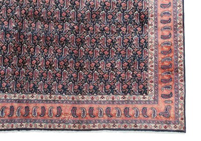Lot 363 - Khorasan Carpet East Iran, circa 1940 The field with an allover design of boteh enclosed by...