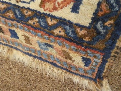 Lot 369 - Afshar Rug South East Iran, circa 1920 The indigo field with two urns issuing flowers enclosed...