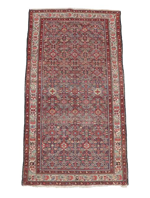 Lot 370 - Feraghan Rug West Iran, early 20th century The indigo Herati field enclosed by ivory borders of...