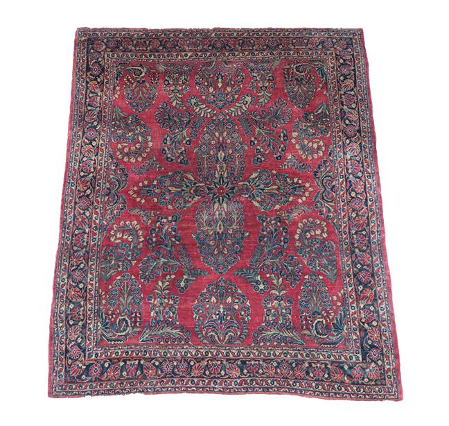 Lot 373 - Saroukh Carpet West Iran, circa 1930 The strawberry field centred by a floral cruciform...