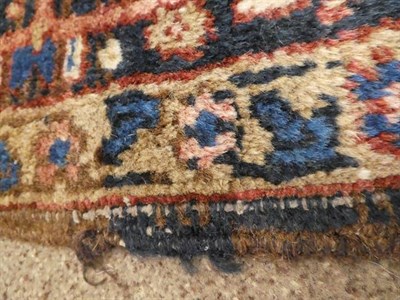 Lot 384 - Heriz Carpet Iranian Azerbaijan, circa 1920 The chestnut field of angular vines around an...