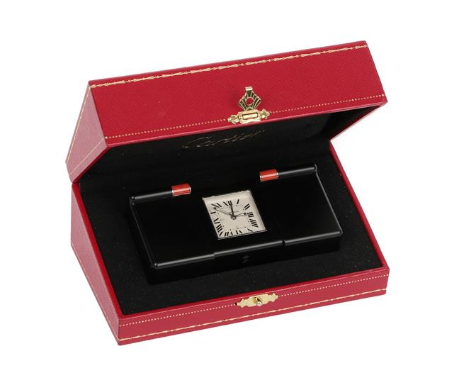 Lot 390 - A PVD Coated Les Pendulette Alarm Desk/Travelling Timepiece, signed Cartier, model: Les Pendulettes