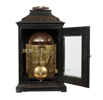 Lot 402 - An Ebonised Striking Table Clock, inverted bell top case with a carrying handle, side glazed...