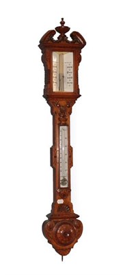 Lot 405 - ~ A Victorian Carved Oak Stick Barometer, circa 1850, swan neck pediment with a central carved...