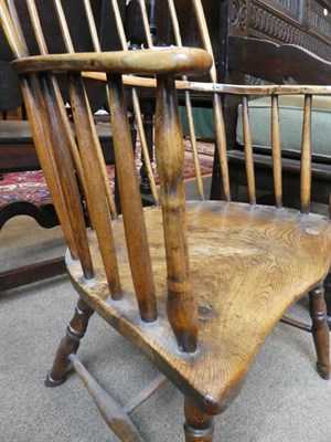 Lot 406 - ~ An Ash Windsor Stick-Back Armchair, circa 1800, the elm moulded seat on turned legs joined by...