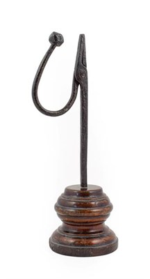 Lot 411 - ~ A Wrought Iron Rushlight Holder, late 18th/19th century, with faceted knop and square section...