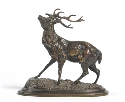 Lot 1284 - Ferdinand Pautrot (French, 1832-1874): A Bronze Figure of a Stag, its head raised, on a rocky...