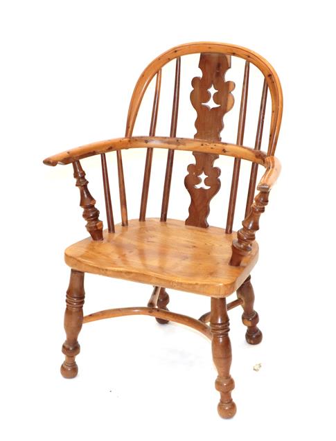 Lot 416 - ~ A 20th Century Child's Yewwood Yorkshire Windsor Armchair, with double spindle back support,...