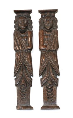 Lot 417 - ~ A Pair of Flemish Oak Caryatid Corbels, early 17th century, carved as male and female...