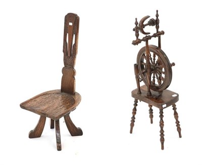 Lot 440 - ~ An 18th Century Oak and Stained Beech Turned Spinning Wheel, the moulded wheel with turned...