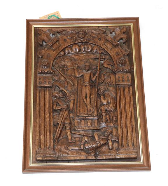 Lot 444 - ~ A Flemish Oak Panel, circa 1620, carved in relief with the Resurrection, Christ standing...