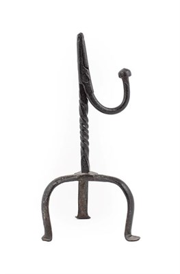Lot 447 - ~ A Wrought Iron Rushlight Holder, 18th century, with ball knop on wrythen stem and scroll...