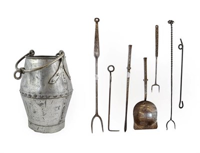 Lot 448 - ~ A Steel Poker and Shovel, 18th century, the square section knopped handles engraved with...