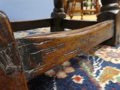 Lot 452 - ~ A Late 17th Century Oak Joint Stool, of peg and nail construction, the moulded top above a...