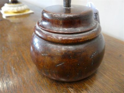 Lot 455 - ~ An Iron Rushlight Holder, 18th century, with cylindrical socket and hinged nip, on a turned treen
