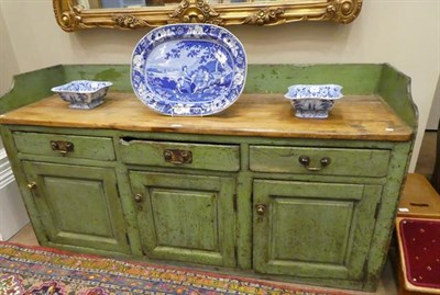 Lot 459 - A George III Green-Painted Pine Dresser, late 18th century, the three-quarter gallery above a...